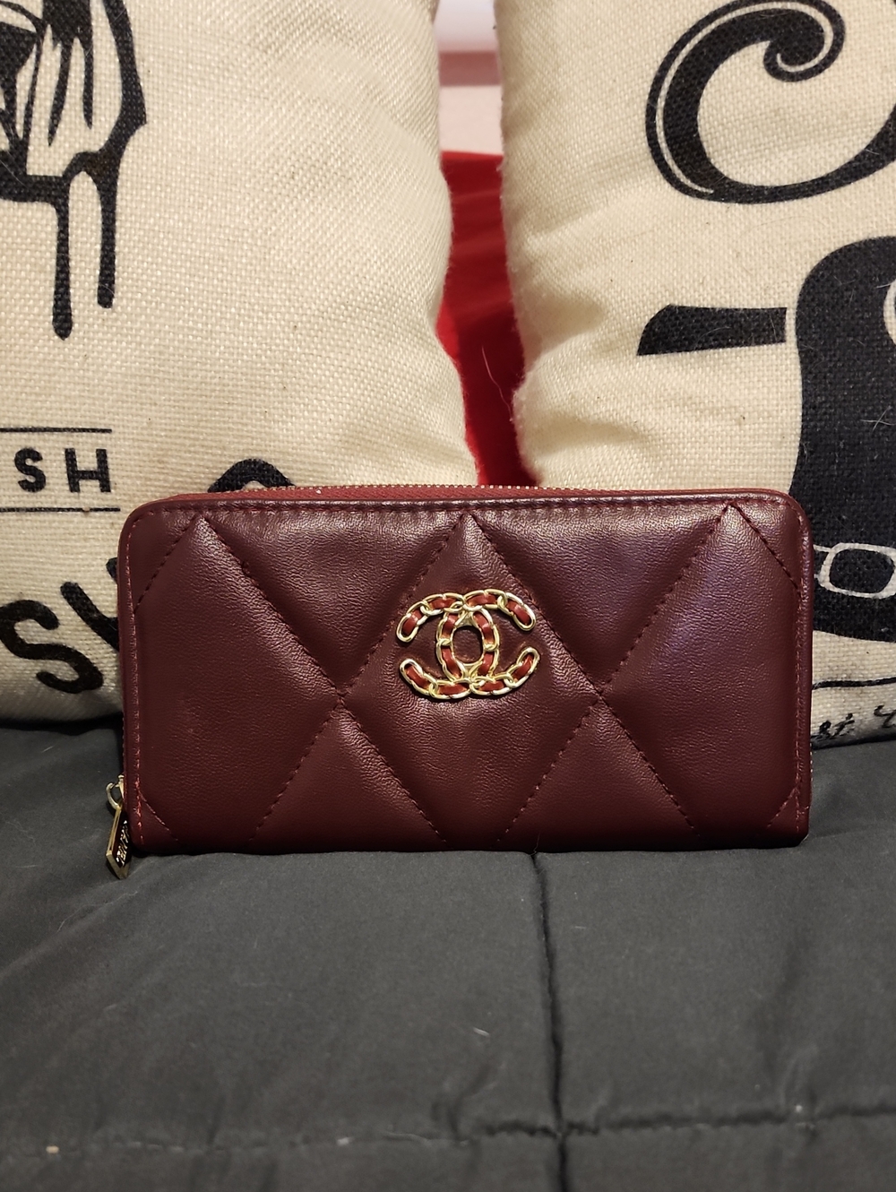 CHANEL Quilted Zip-Around Leather Wallet in Burgundy with Gold Logo